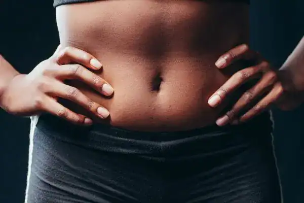 Toning Your Stomach: The Ultimate Guide to Achieving a Sculpted Stomach While Shedding Pounds 1 Image of a toned stomach after non surgical treatment Bridgend